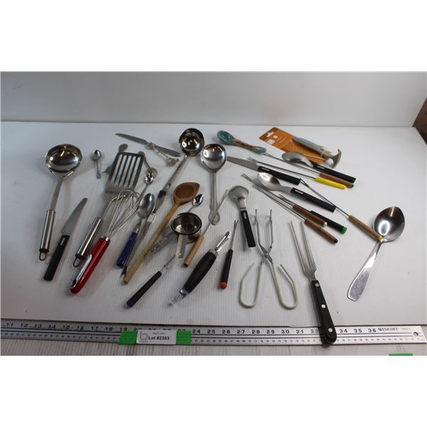 Whisk, Measuring Cups and Assorted Kitchenware