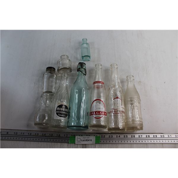 (9) Assorted Soda Bottles
