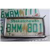 Image 5 : (10) Assorted Saskatchewan Licence Plates, Axe and Fertilizer Sprayer