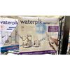Image 2 : SHELF LOT OF WATER PIK WATER FLOSSERS *UNKNOWN WORKING CONDITION/ MAY BE MISSING PIECES*