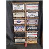 Image 1 : Souvenir License Plates on Display Pegboard