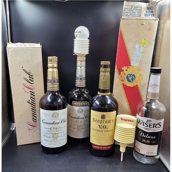 Large Canadian Club, Seagram's, and Wiser's Bottles