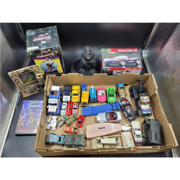 Vintage Toy Cars, Diecast Sting Ray III, The Best of He Man, and More
