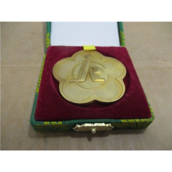GOLD TONE MEDAL IN ASIAN BROCADE BOX CELEBRATING "CHINESE WELFARE FUND FOR THE HANDICAPPED"