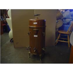 Old copper tank dispenser