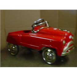 Older Red pedal car