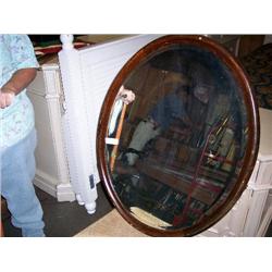 Oak frame beveled oval mirror