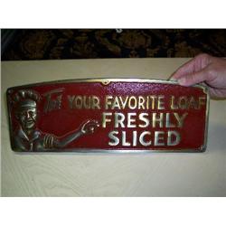 Freshly sliced metal sign