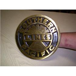 Round heavy metal southern pacific lines sign