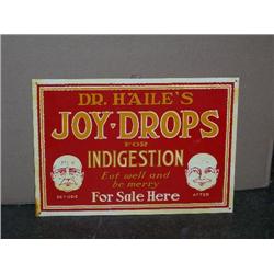 Joy drops tin sign 10x14