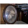 Image 1 : Oval walnut frame bowed glass 23x17