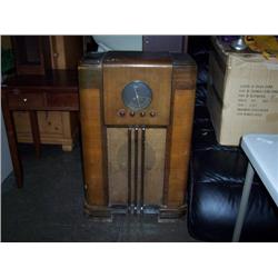 Old radio cabniet venere peeling off on top