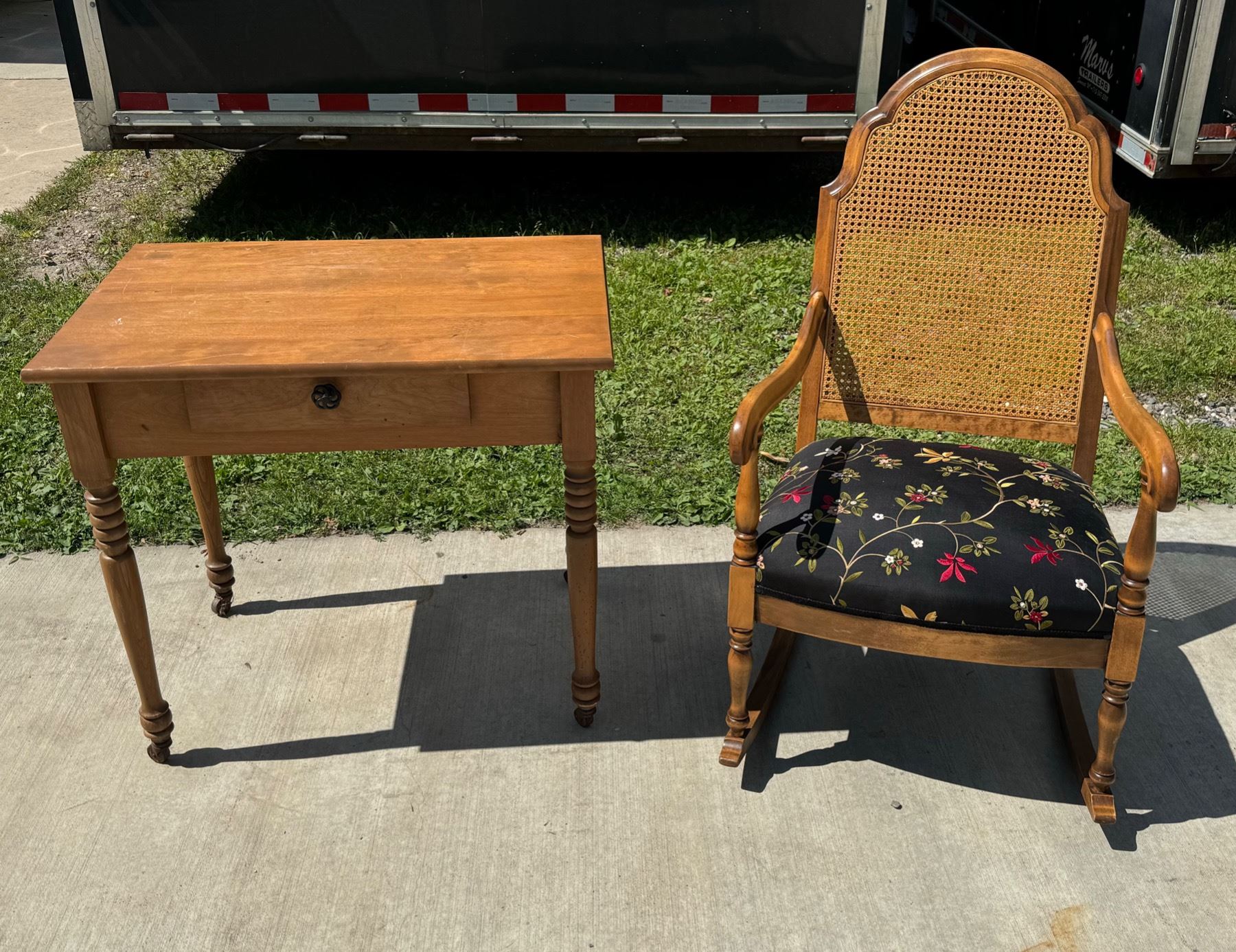 UPHOLSTERED CANE BACK ROCKING CHAIR AND SMALL LIBRARY TABLE