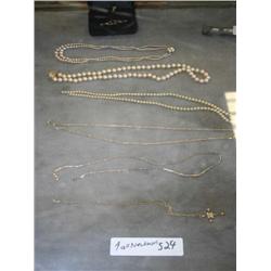 3 GOLD NECKLACES AND 2 PEARL NECKLACES