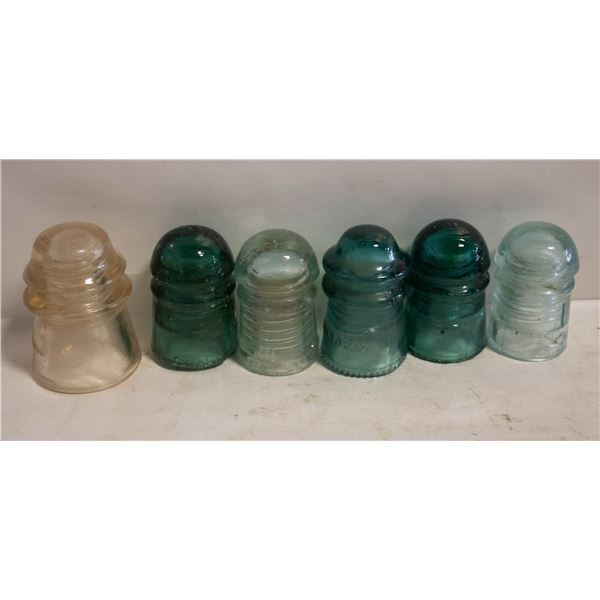 SIX VINTAGE GLASS INSULATORS