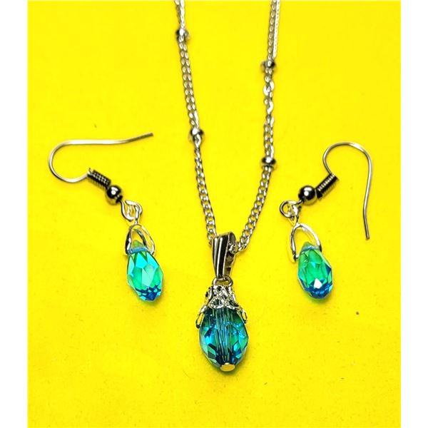 8)  AQUA BLUE SWAROVSKI CRYSTAL PENDANT ON 18" CH