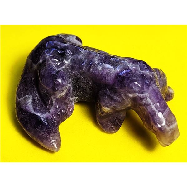 12)  NATURAL AMETHYST THAT IS CARVED INTO A LIZARD