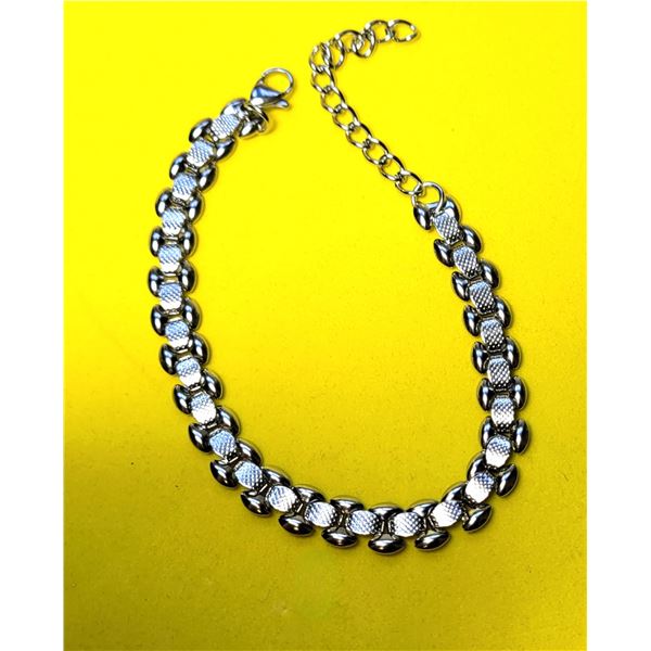 11)  SILVER TONE 7" WITH 2" EXTENDER BRACELET WI
