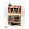 Image 1 : VINTAGE NEVADA BUCKAROO BANK SLOT MACHINE