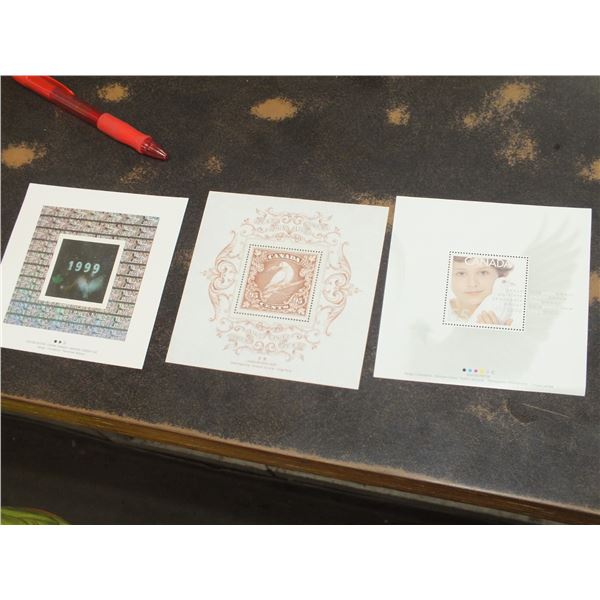 3 Canadian Stamps & 1 Millennium Coin
