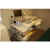Image 1 : EKG MACHINE, COMPUTER, TABLE, MISCELLANEOUS ITEMS