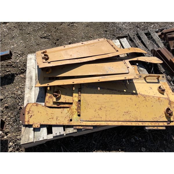 Four D65 Komatsu engine side panels