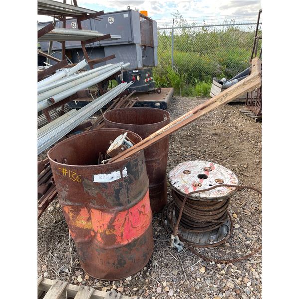 Two 45 Gallon Steel Drums with misc metal, and reel of 3/4" Wire rope