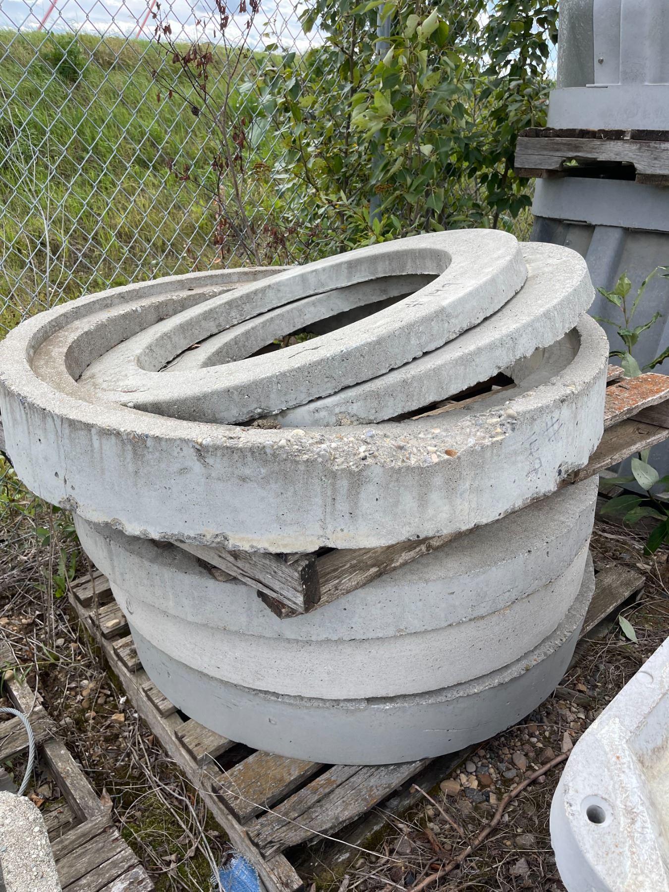 Six Concrete manhole risers, 2 - 24