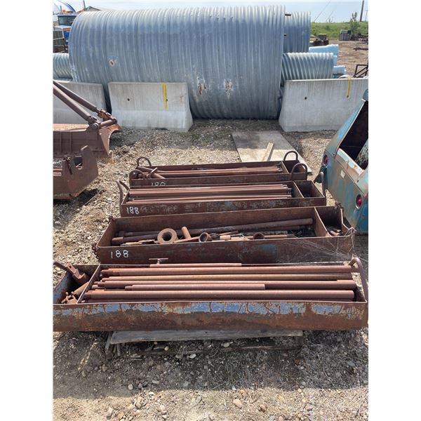 Four steel baskets with push rod and accessories