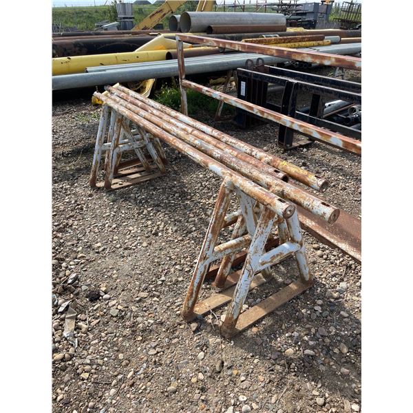 Four steel pipe racks, 8ft long