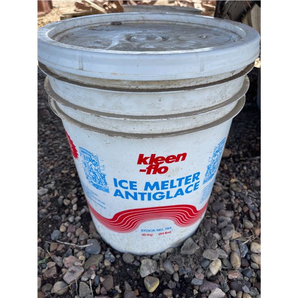 Bucket of ice melt and barrel dolly