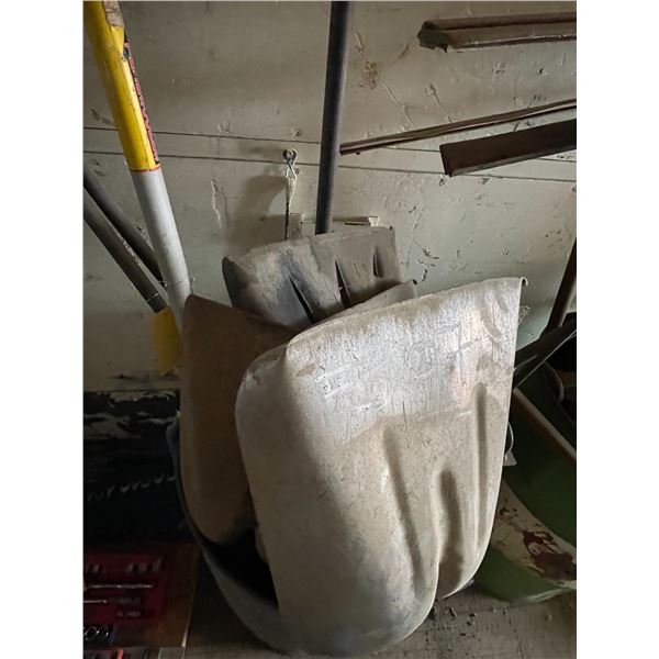 Quantity of shovels, 3 steel rods and steel barrel
