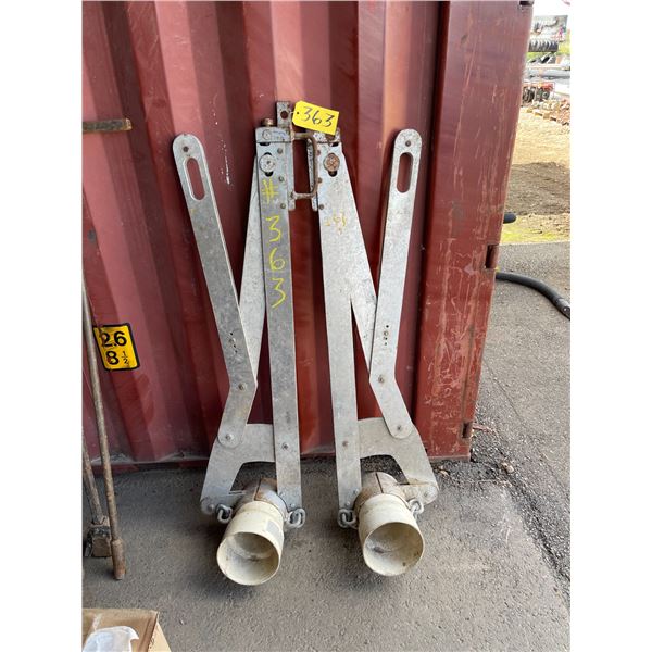 Two aluminum pipe clamps