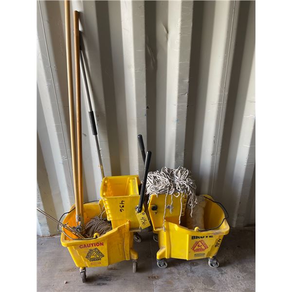 Two RUBBERMAID Commercial buckets with wringers and Mops