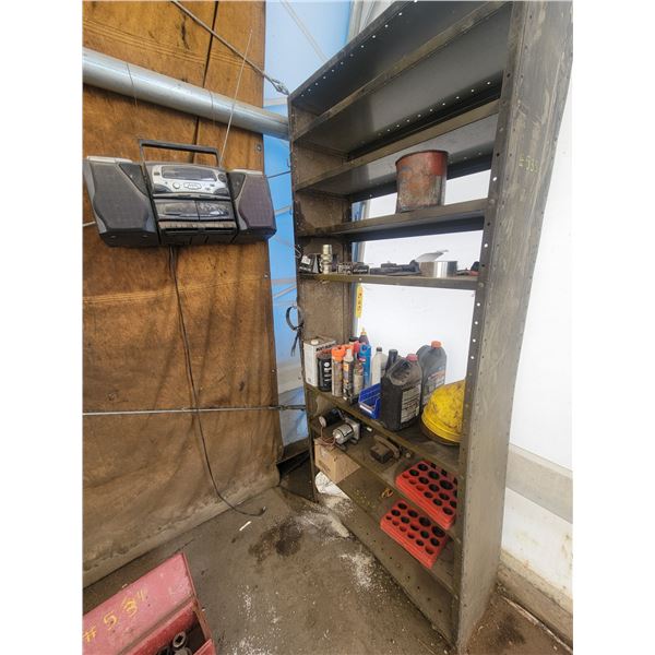 Shelving with misc. items and portable tape deck/radio