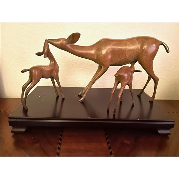 Doe & Fawns by Loet Vanderveen