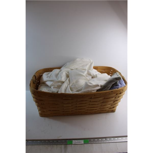 Woven Basket, Blankets and Bed Sheets