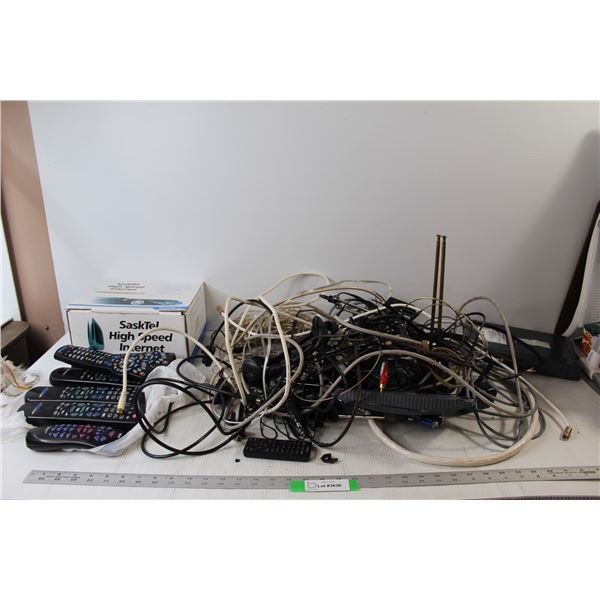 SaskTel High Speed Internet Self Install Kit, Assorted Remotes, Assorted Household Electronics - Tan