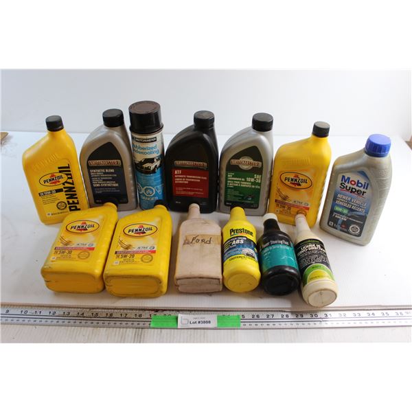 (13) Assorted Automotive Liquids - 5W30, 10W30 Motor Oil, Transmission and Brake Fluids