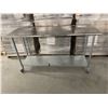 Image 1 : Stainless Steel Table w/ wheels and drip rail - 72x24x39" - Does not include contents