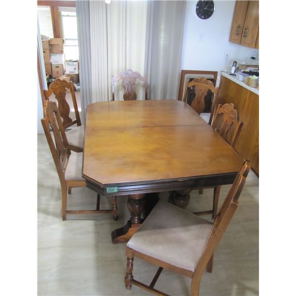 Dining room table,  scissor leaf , captains chair and 5 side chairs