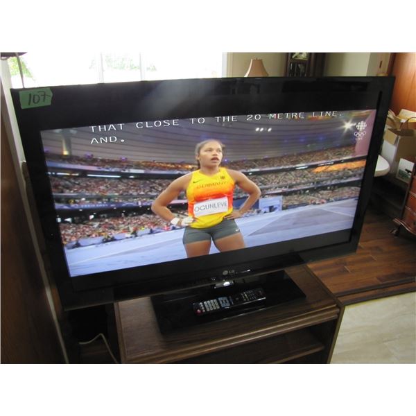 LG flat screen TV with remote
