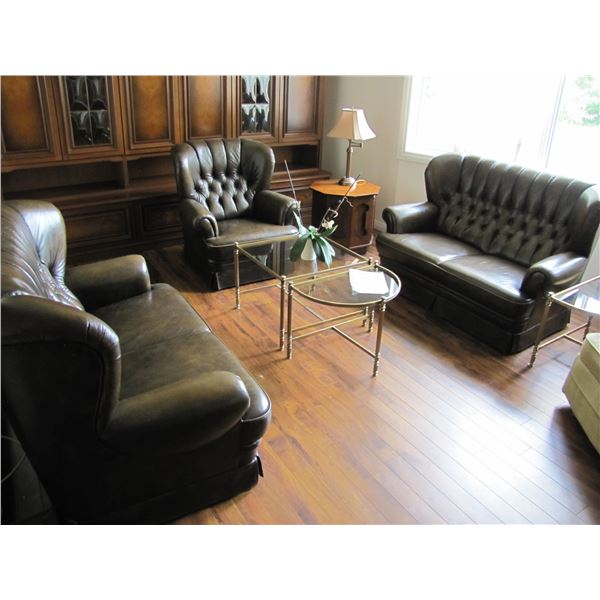 Two leather love seats and 1 leather chair Button back -- Minor scratches and wear