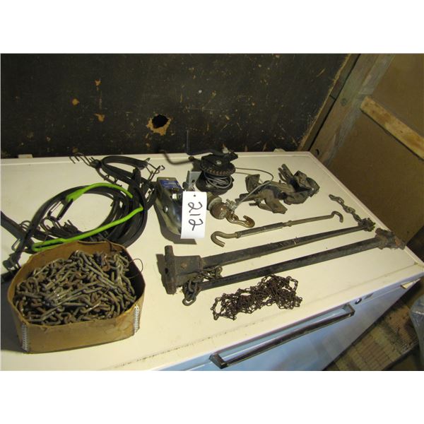 Trailer stabilizer , tie down straps, tire chains , hand winch, trailer coupler
