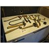 Hammers , crowbar , hatchets, hand drill ,