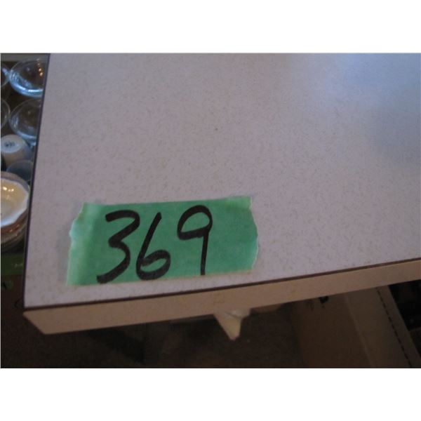 Small table with chrome legs