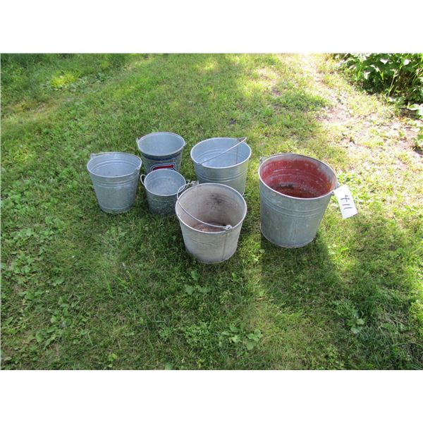 collection of tin pails