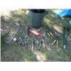 Image 1 : garbage can with lawn and garden tools and items