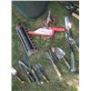 Image 9 : garbage can with lawn and garden tools and items