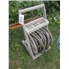 Image 1 : Garden hose on hose reel